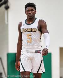 "Hilltopper Prep basketball player number 5 poses during a game break"
