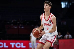 "Spanish basketball player in action, dribbling during an international match, wearing jersey number 7."