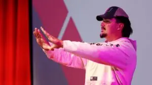 "University of Miami player in casual attire during a promotional event"