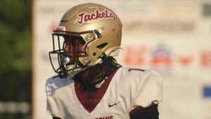"Florida 2026 recruiting weekend glimpse with a Jackets player in focus, displaying intensity and readiness."