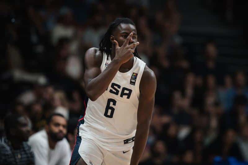 Caleb Holt celebrates a scoring play during an international game
