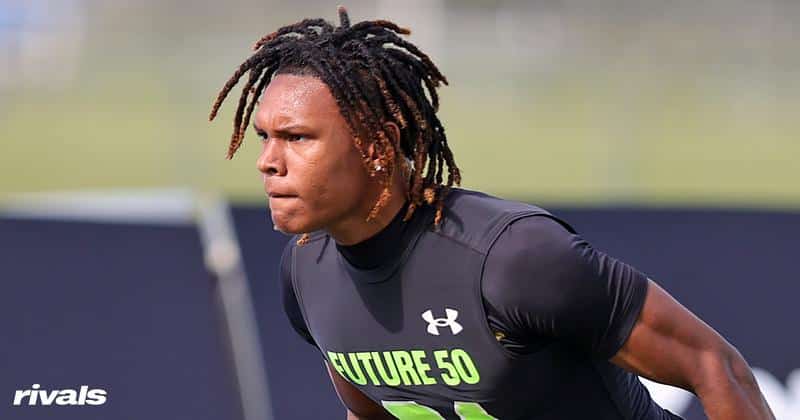 Future 50 linebacker in action during college football recruiting camp performance